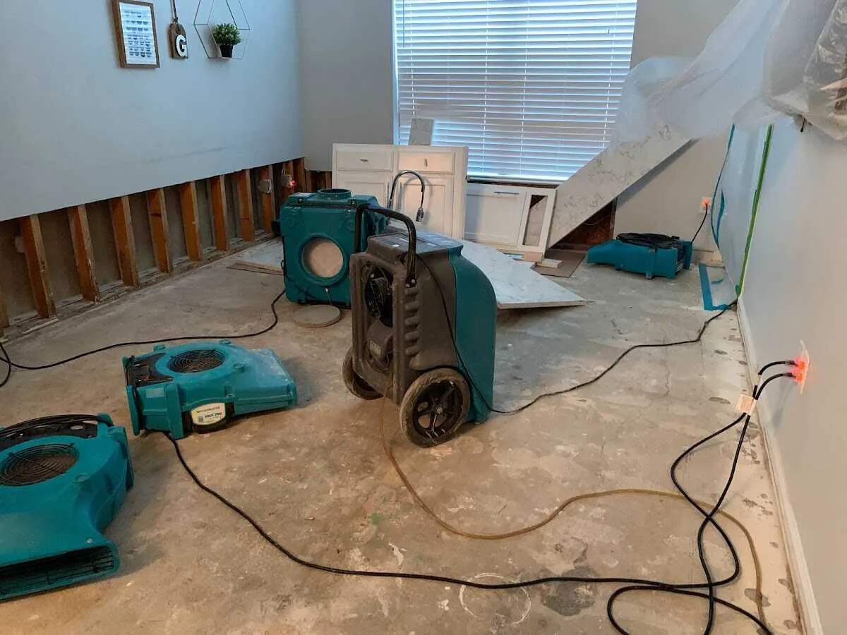 Dehumidifier in flood-cut room for Water Damage Restoration in Mayflower Village